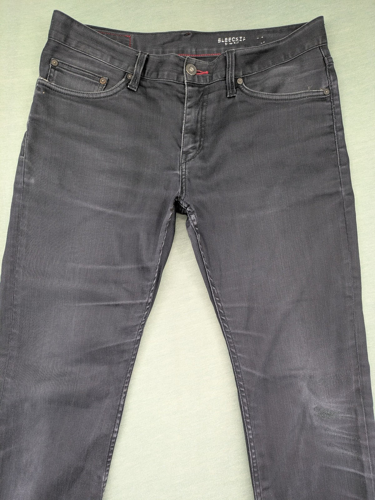 Tommy Hilfiger grey straight jeans faded denim with iconic logo detail.