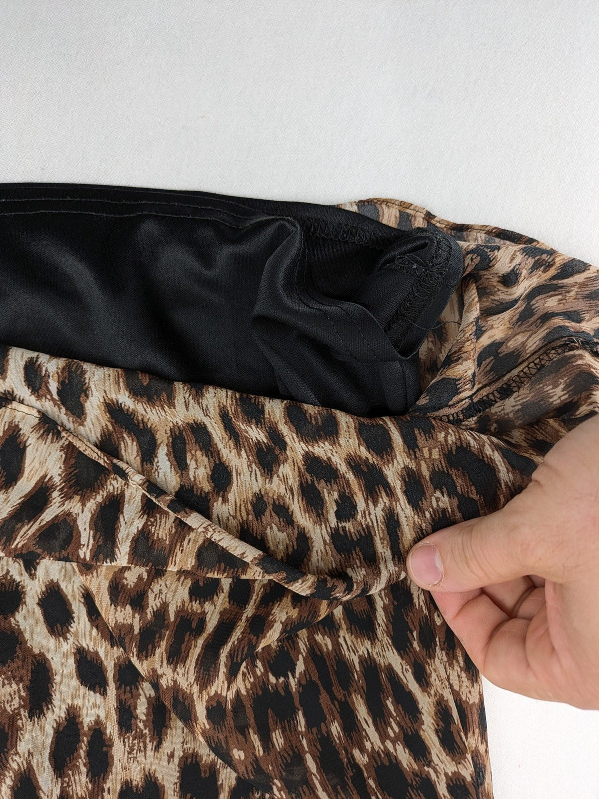 Atmosphere beige leopard print dress with sheer chiffon sleeves and buttoned cuffs.
