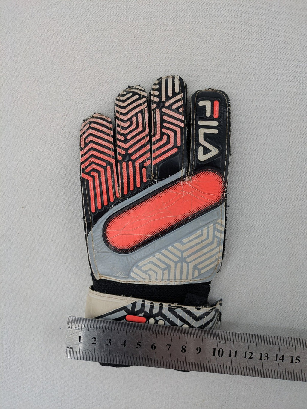 Fila soccer gloves black grey red geometric pattern padded backhand