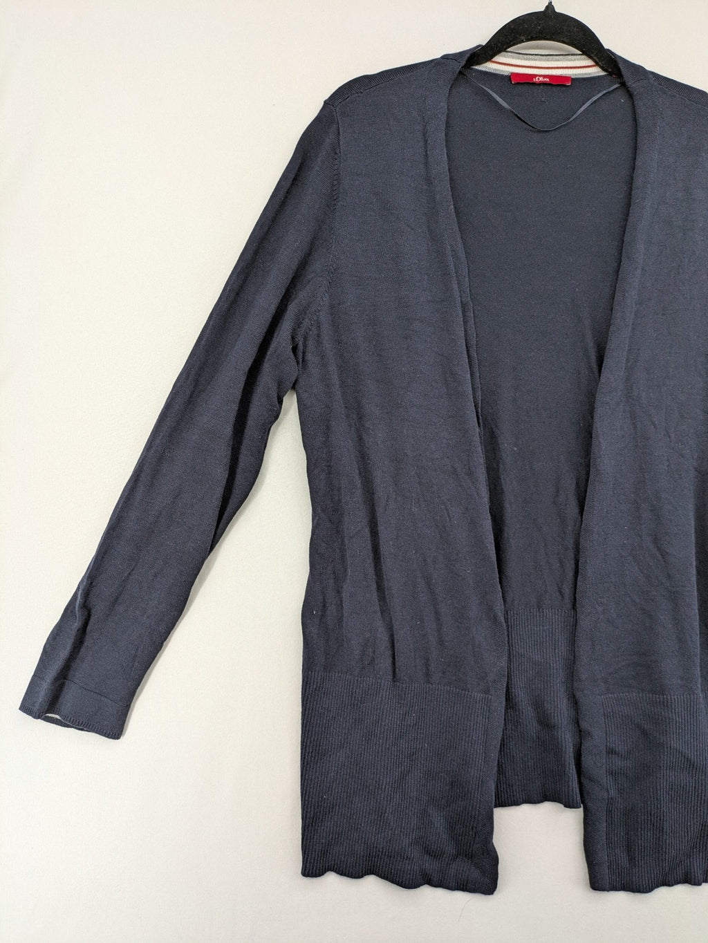 s.Oliver green turtle neck jumper soft viscose blend with ribbed cuffs and subtle logo.