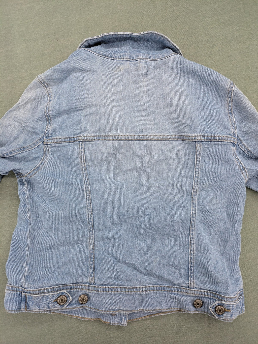 Pimkie blue denim jacket with classic cut, button placket, and two chest pockets.