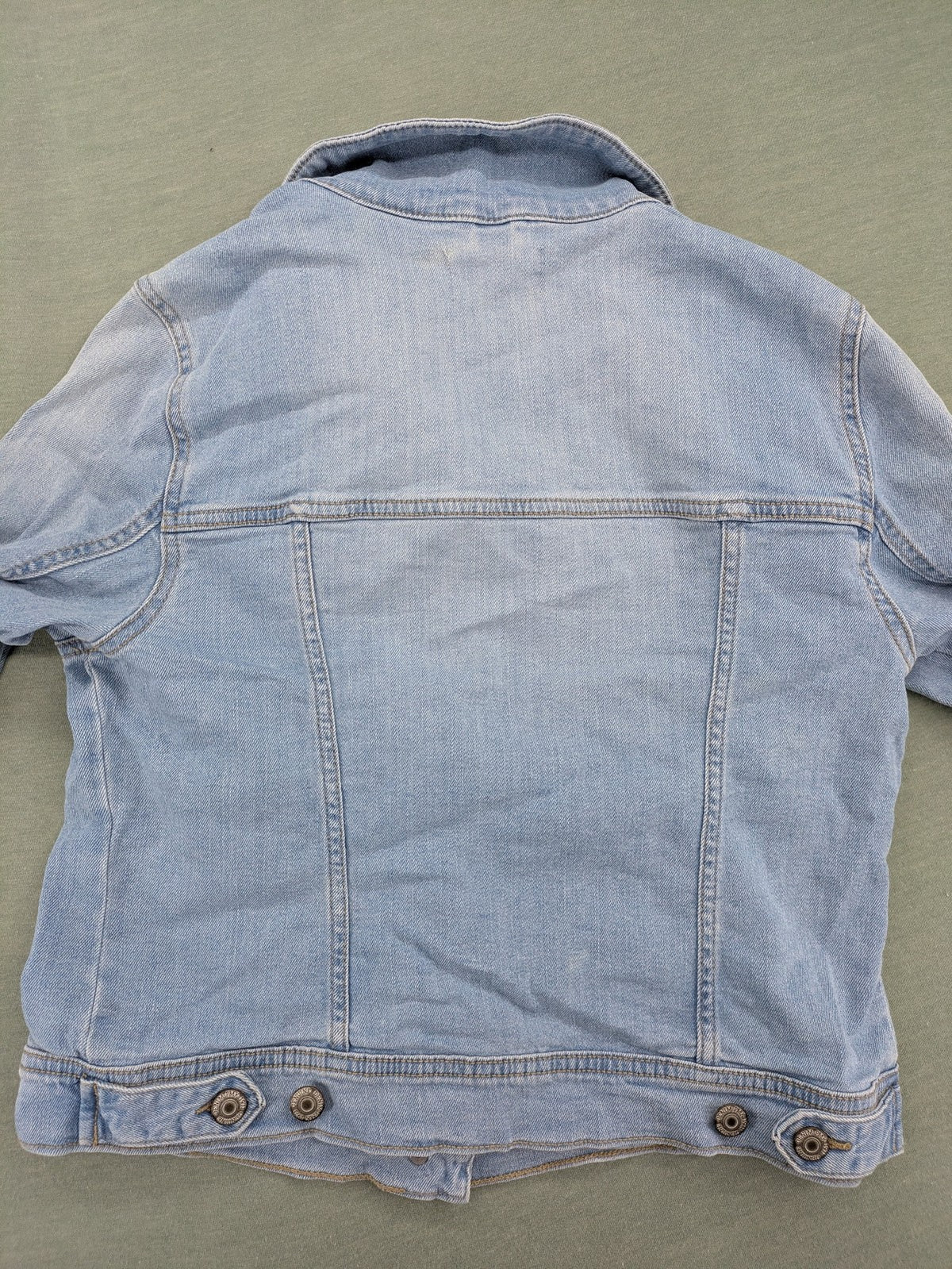 Pimkie blue denim jacket with classic cut, button placket, and two chest pockets.