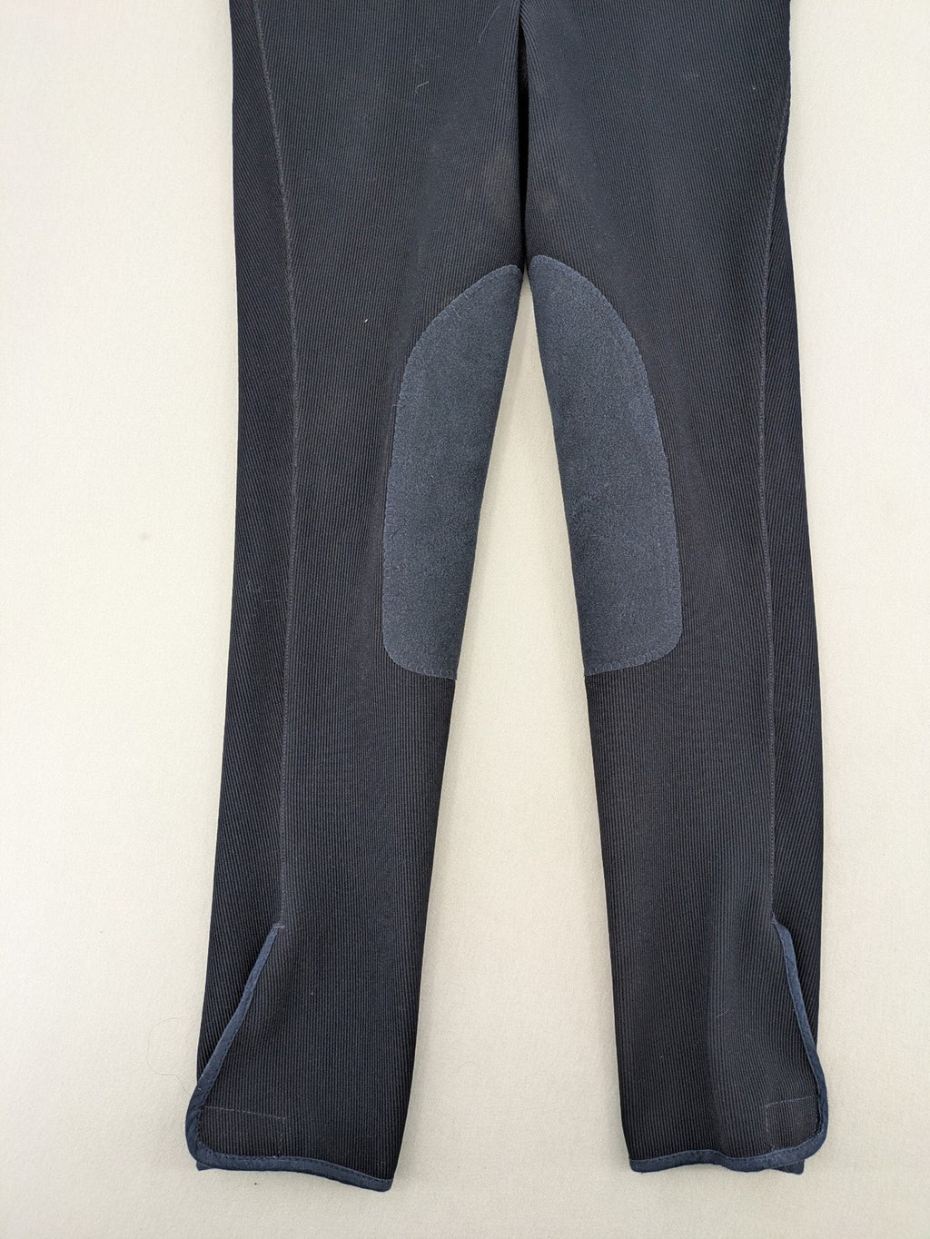 Cavalliero blue youth riding pants with knee patches and ribbed microfiber fabric.