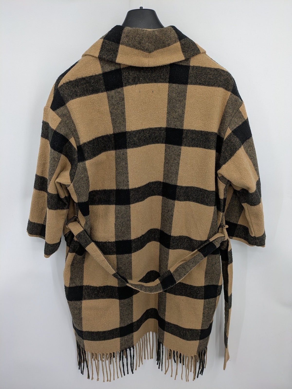 Reserved cream coat with brown and black check pattern, fringe hem, wool blend material.