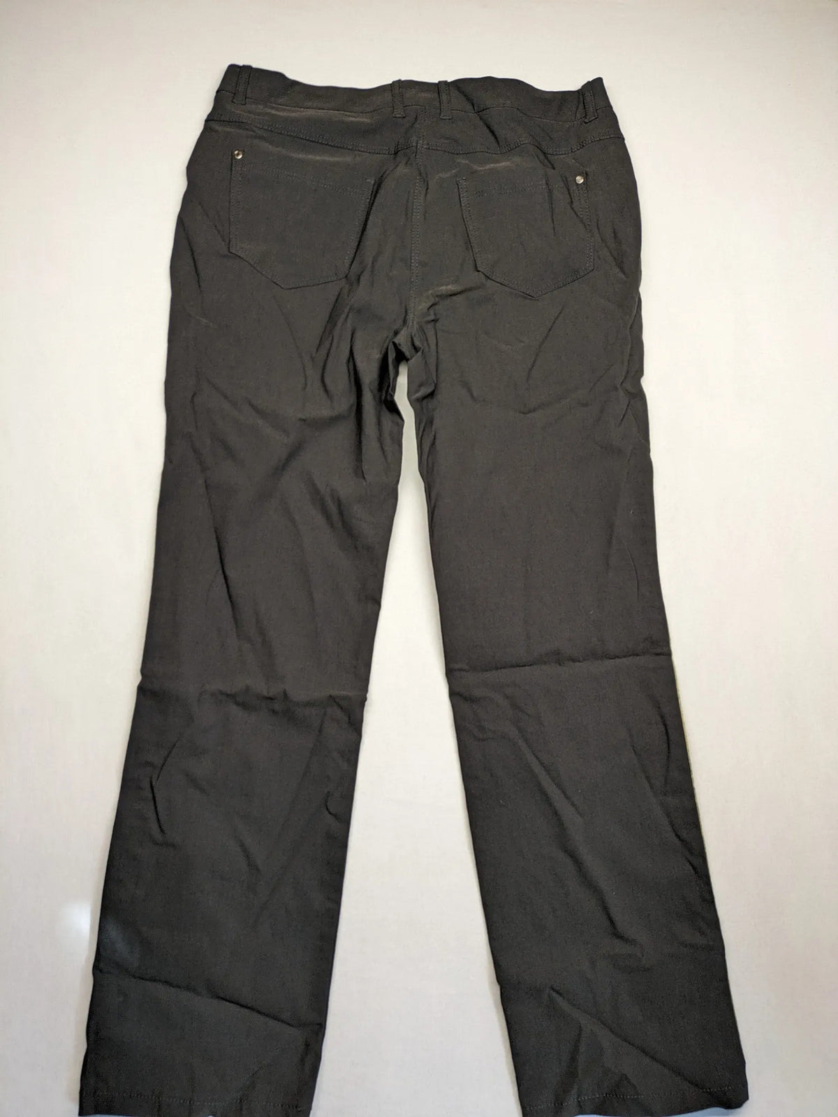 Elegante multi pants grey leopard print side stripes, stretchy material with pockets.