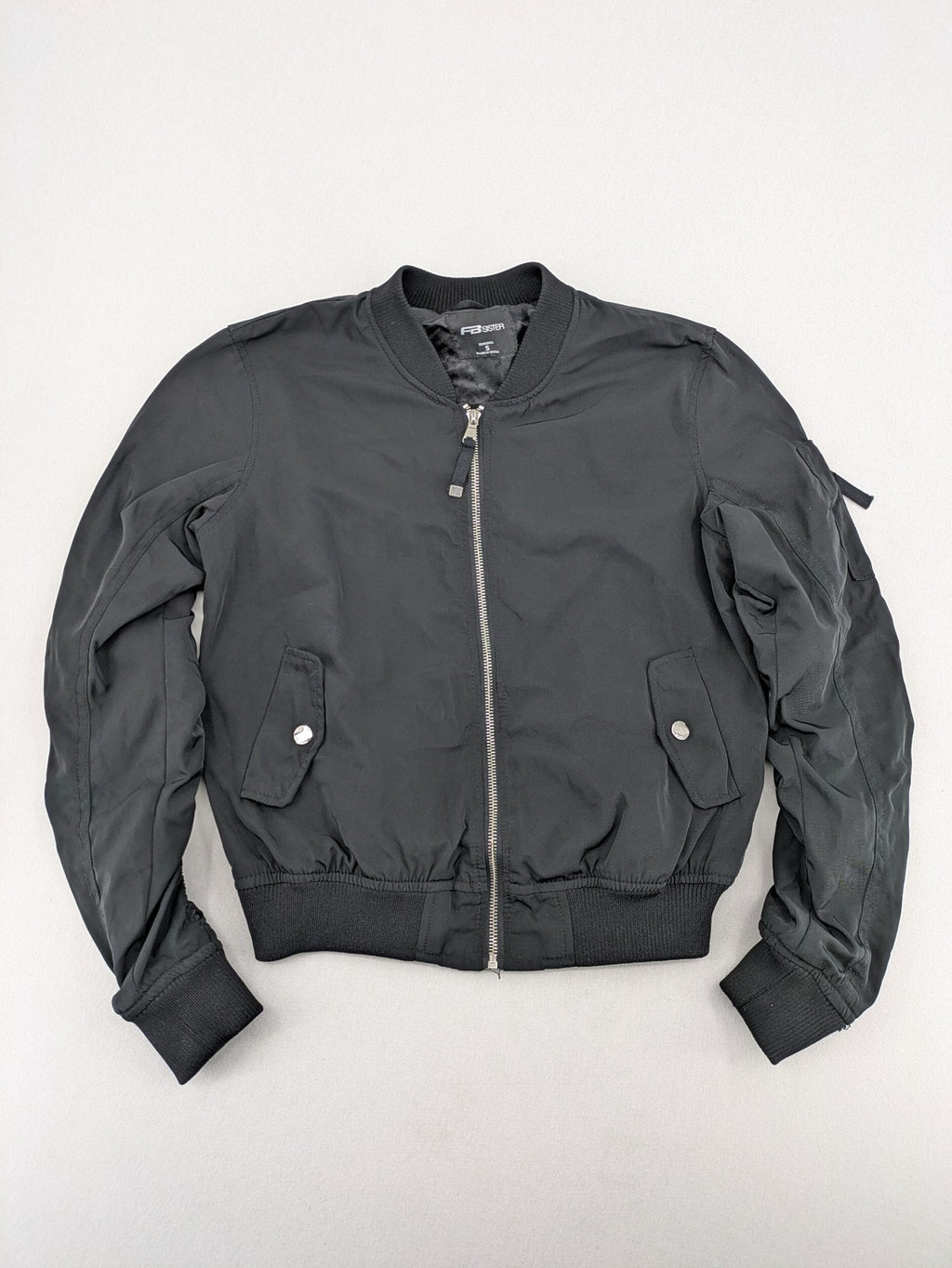FB Sister grey bomber jacket with full zip, ribbed cuffs, and smooth polyester material.