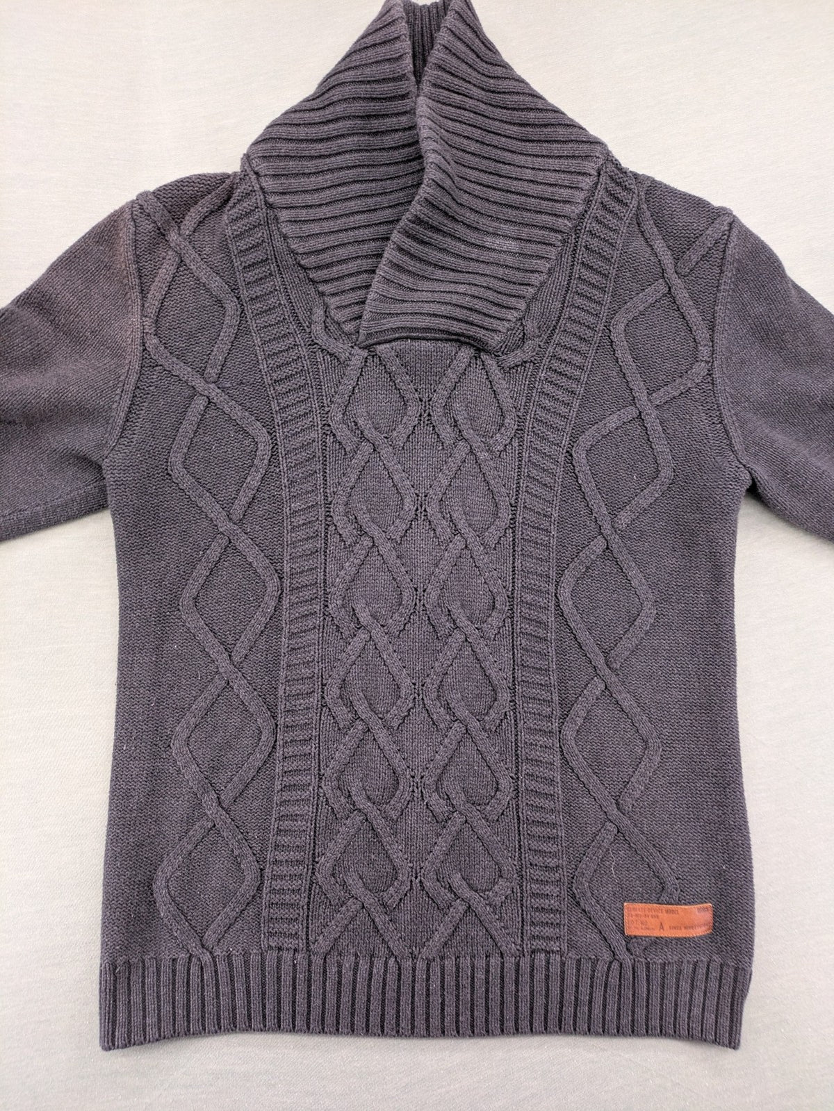 IZAC grey turtle neck jumper with cable knit pattern and used look finish.