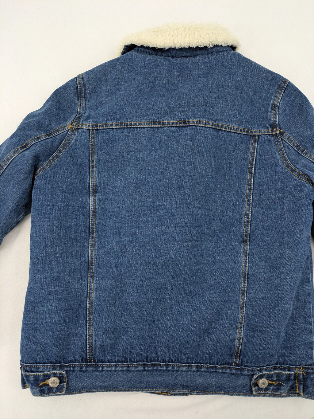 Denim & Co. blue jacket with cream Sherpa lining, button closure, and pockets.