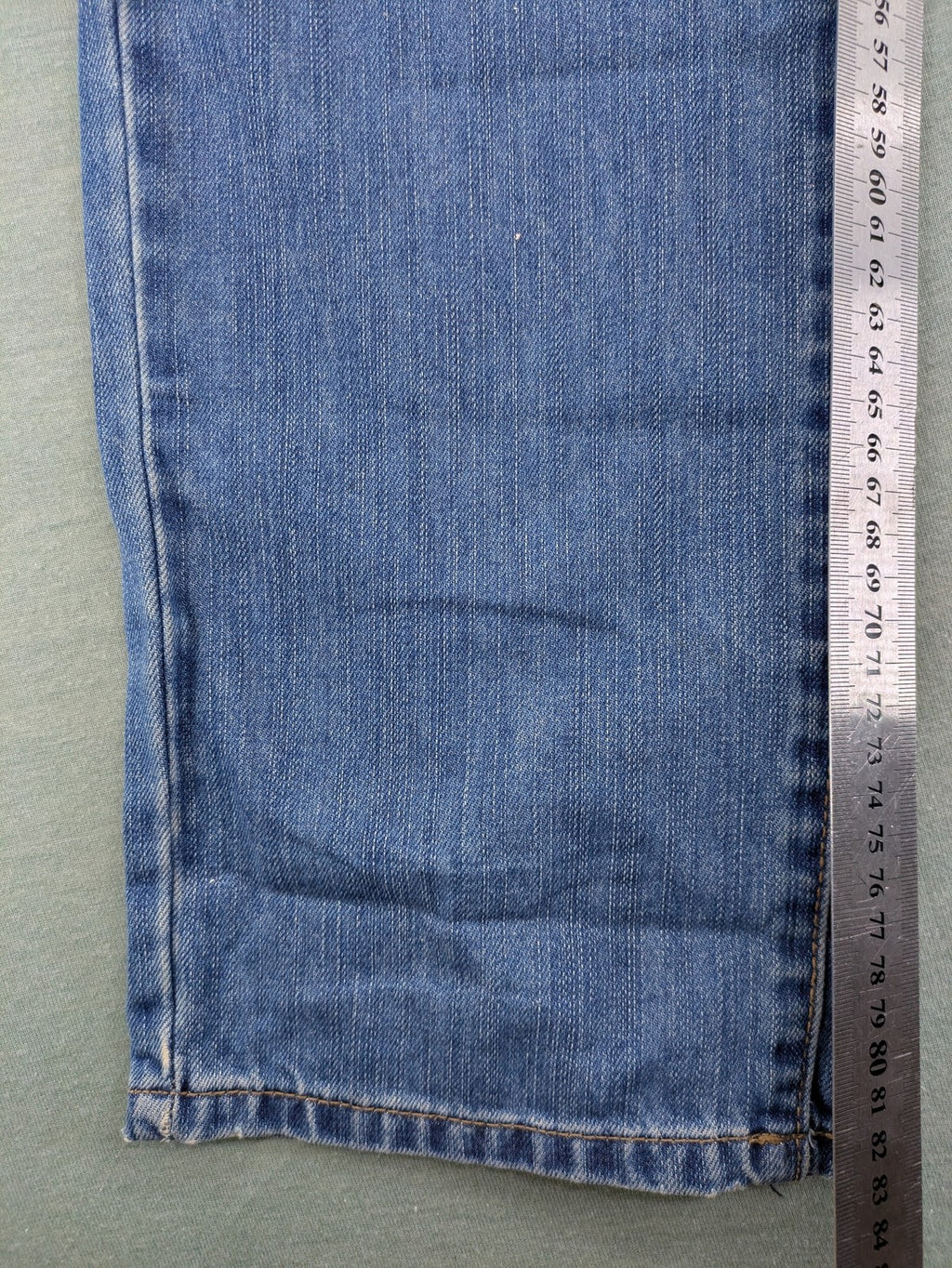 Benetton Jeans blue straight leg denim with button fly and classic design.