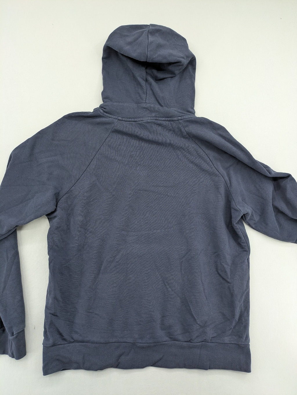 Hummel grey turtle neck jumper featuring large logo, kangaroo pocket, cotton blend material.