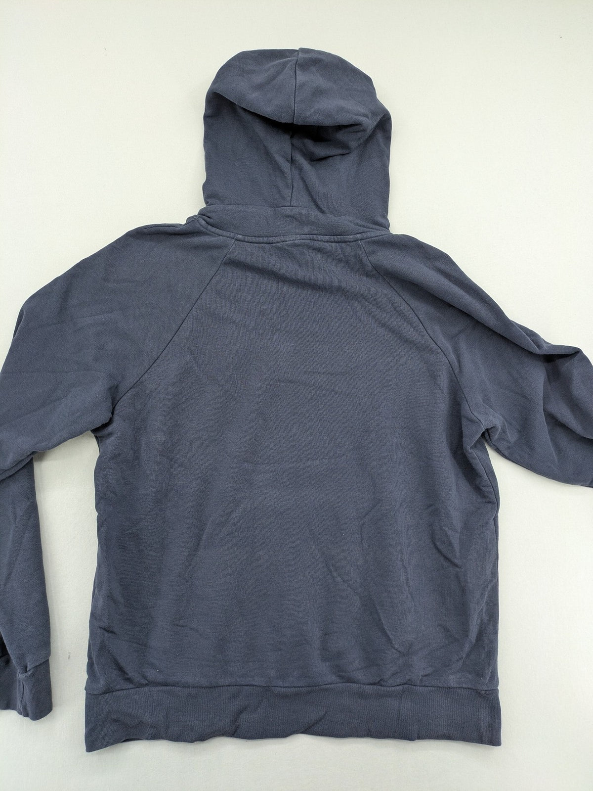 Hummel grey turtle neck jumper featuring large logo, kangaroo pocket, cotton blend material.