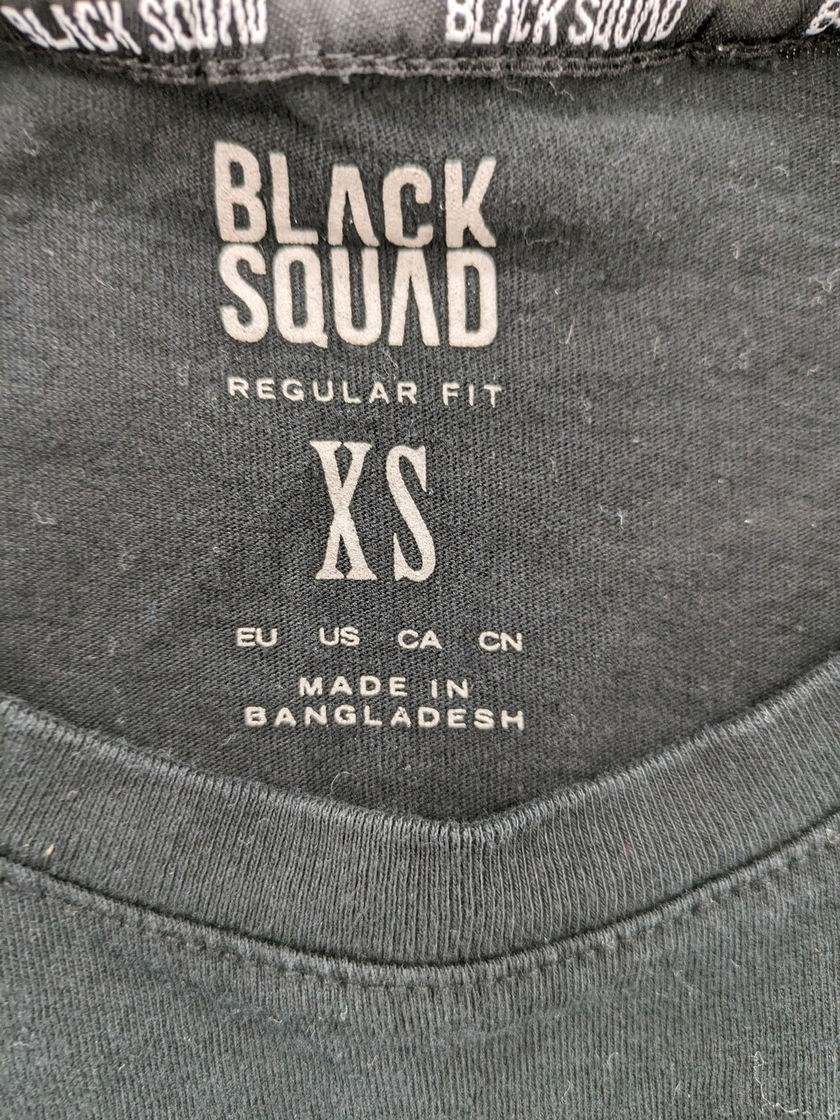 Black Squad black t-shirt all-over graphic print with logo patch on sleeve.