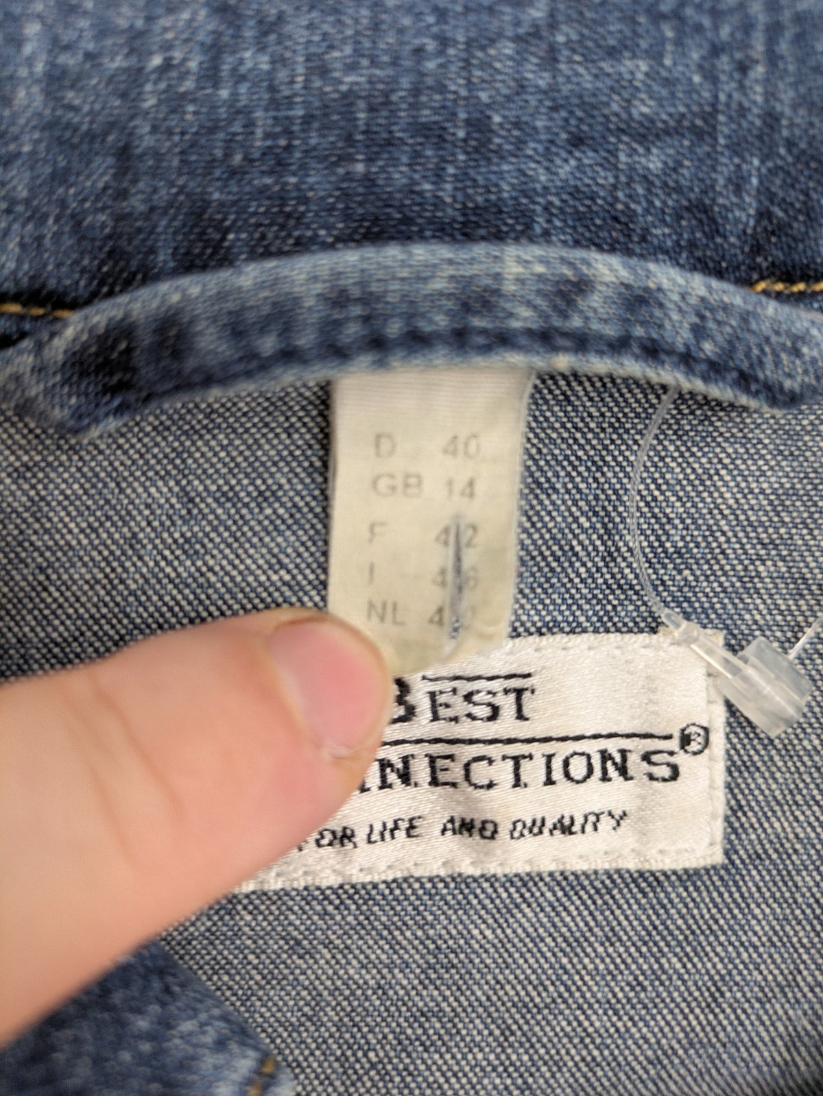 Best Connections cream denim jacket classic design with button placket and two chest pockets.