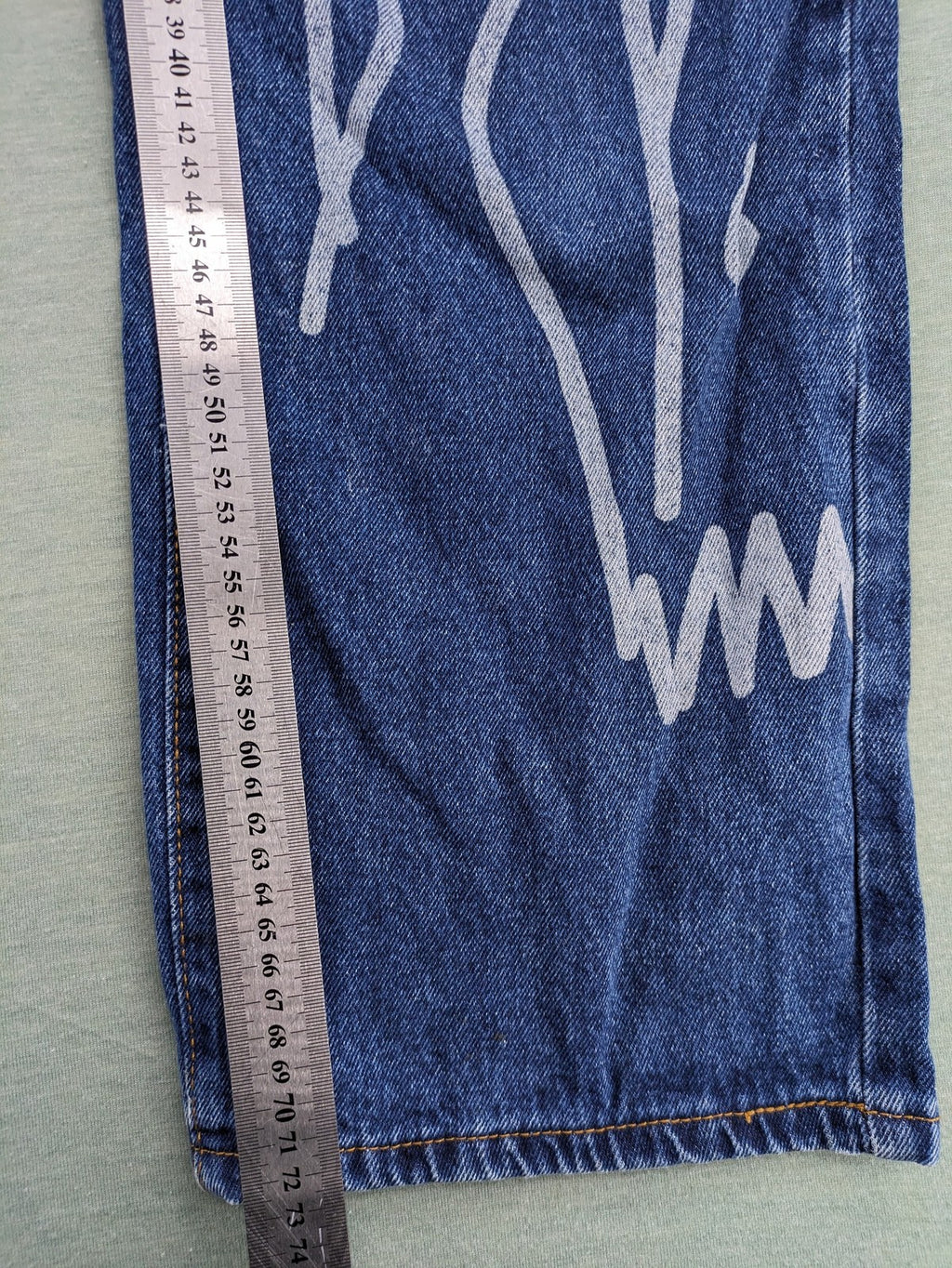SHEIN blue wide-leg jeans high waist with white smiley face graphics and classic 5-pocket design.