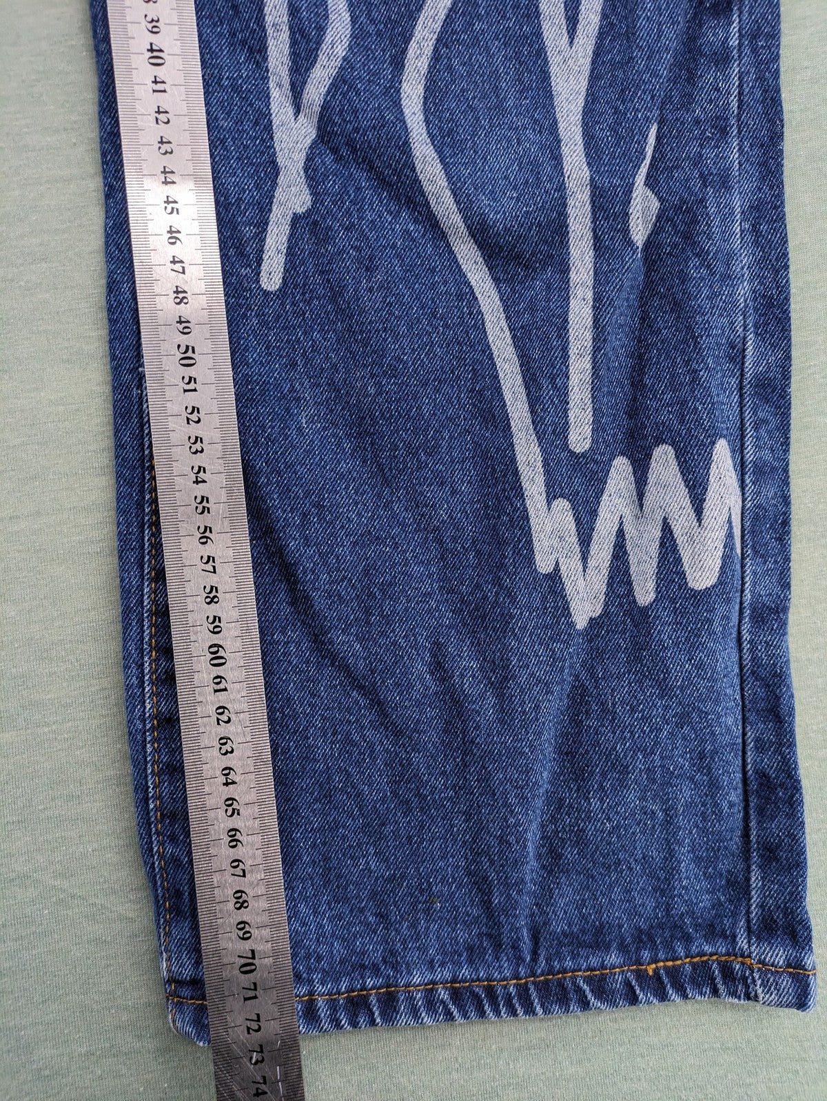 SHEIN blue wide-leg jeans high waist with white smiley face graphics and classic 5-pocket design.