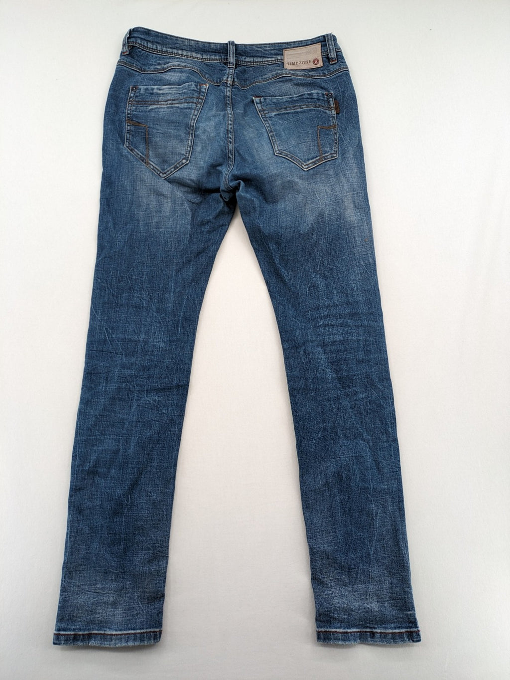 Timezone blue straight jeans slim fit with checkered pattern lining and button fly.