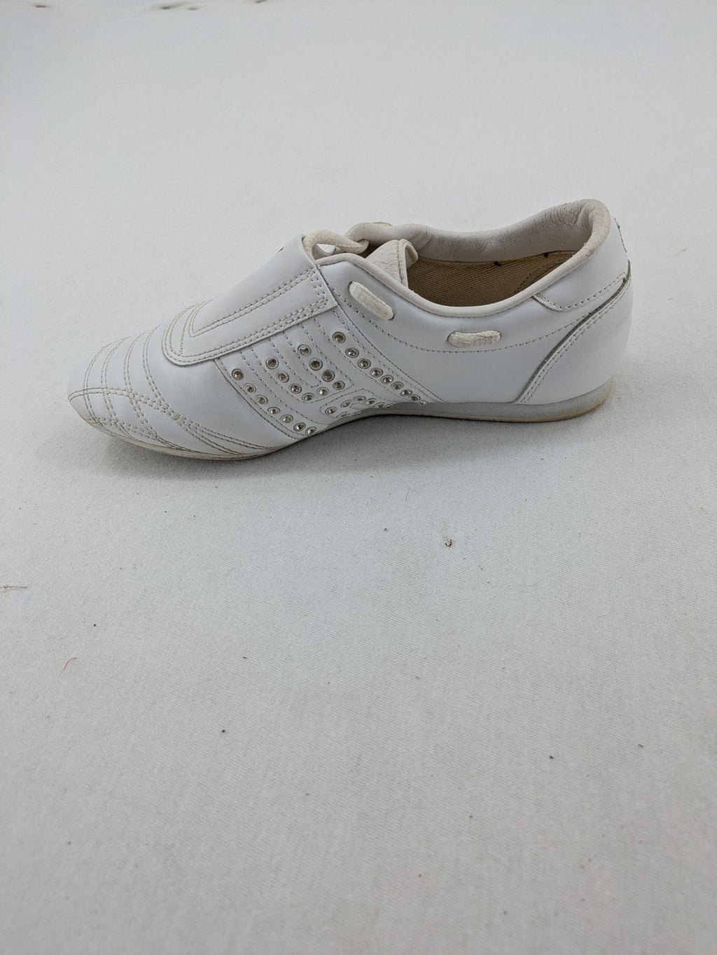 Venice low-top sneakers beige and white with rhinestone embellishments and unique sole pattern.