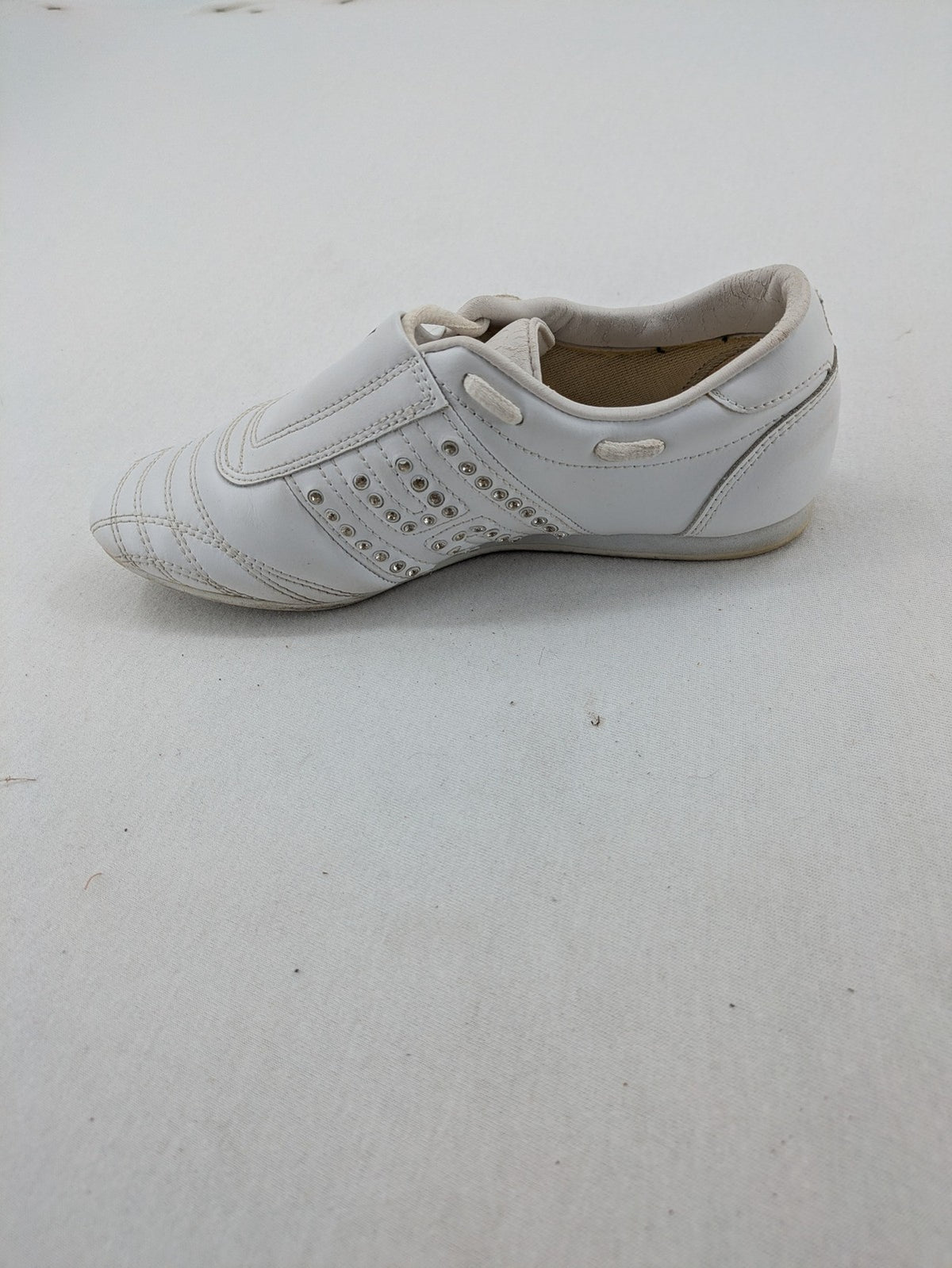 Venice low-top sneakers beige and white with rhinestone embellishments and unique sole pattern.