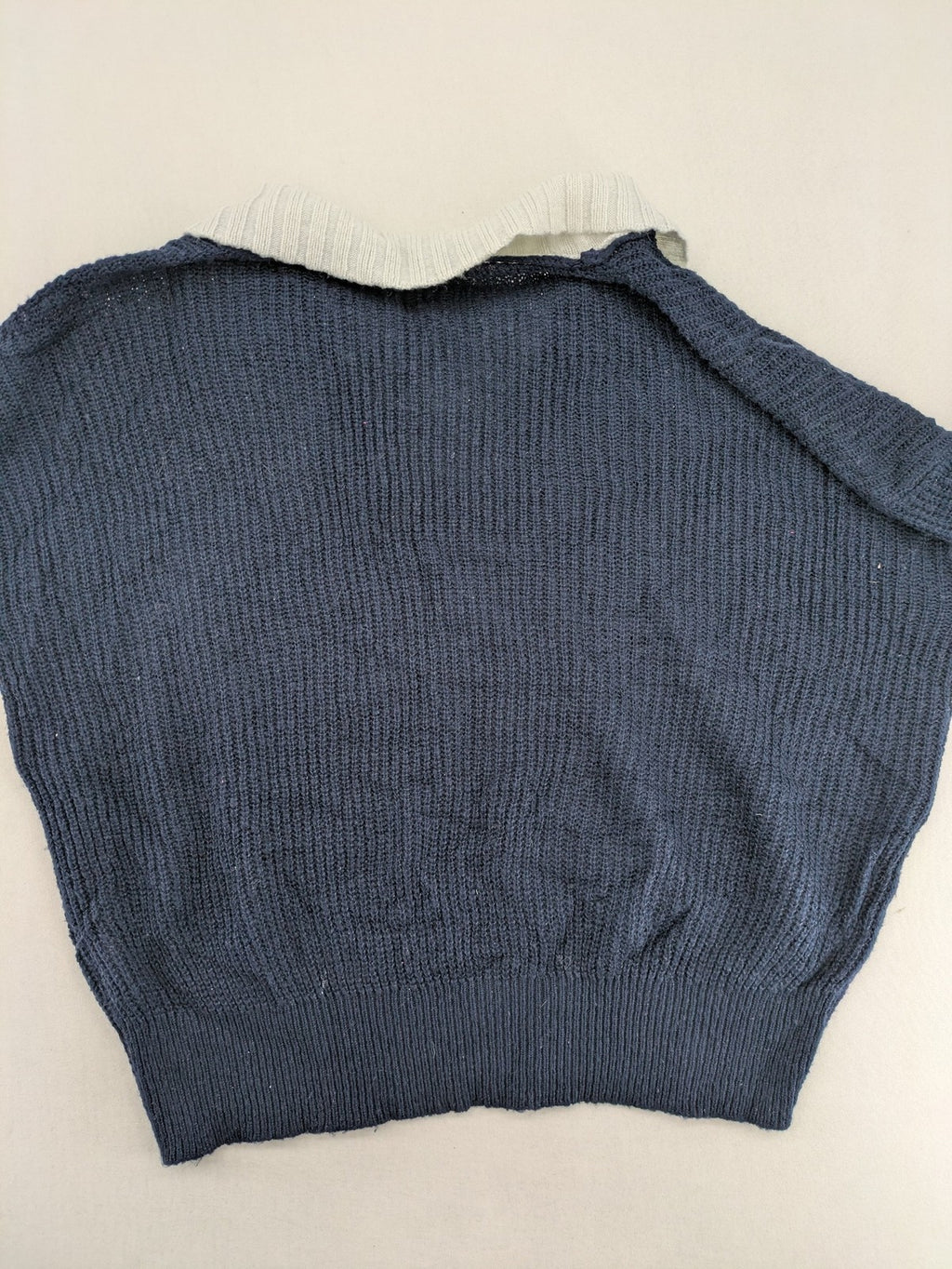 Dazy navy turtle neck jumper with contrasting collar and gold heart button detail.