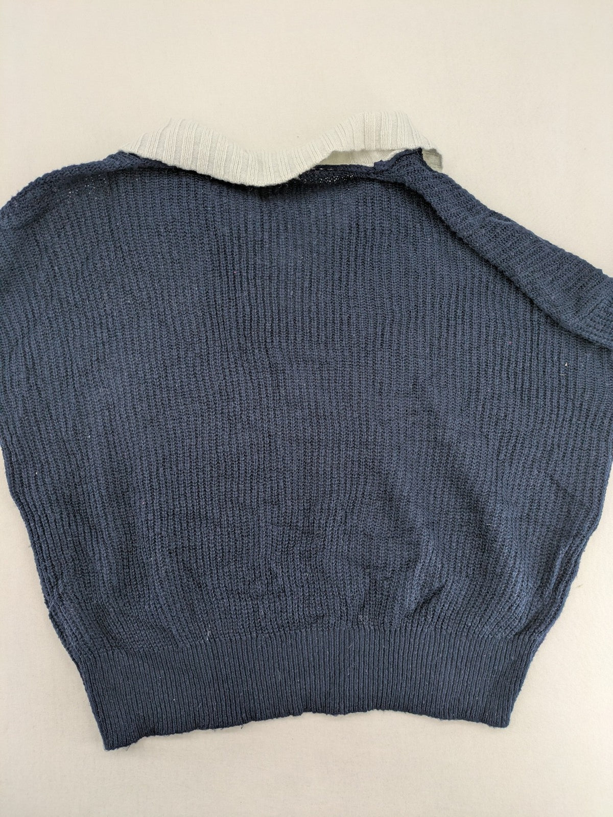 Dazy navy turtle neck jumper with contrasting collar and gold heart button detail.