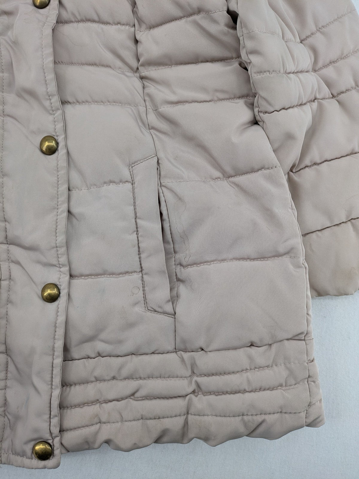 Brit Island beige puffer coat with fleece lining and faux fur hood detail.