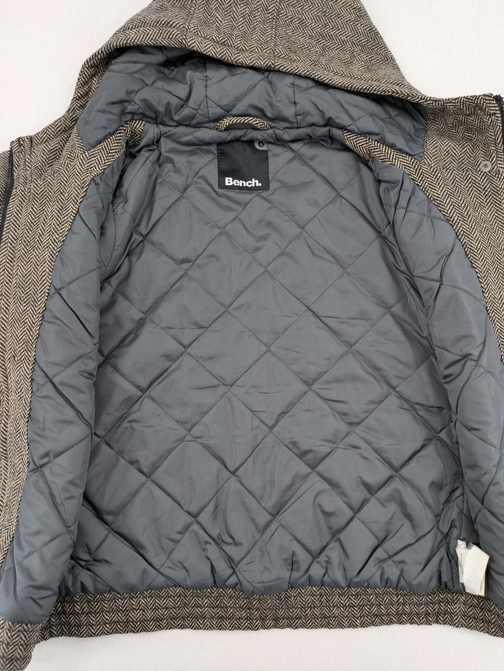 Bench beige-brown duffle coat with herringbone pattern and toggle closures.