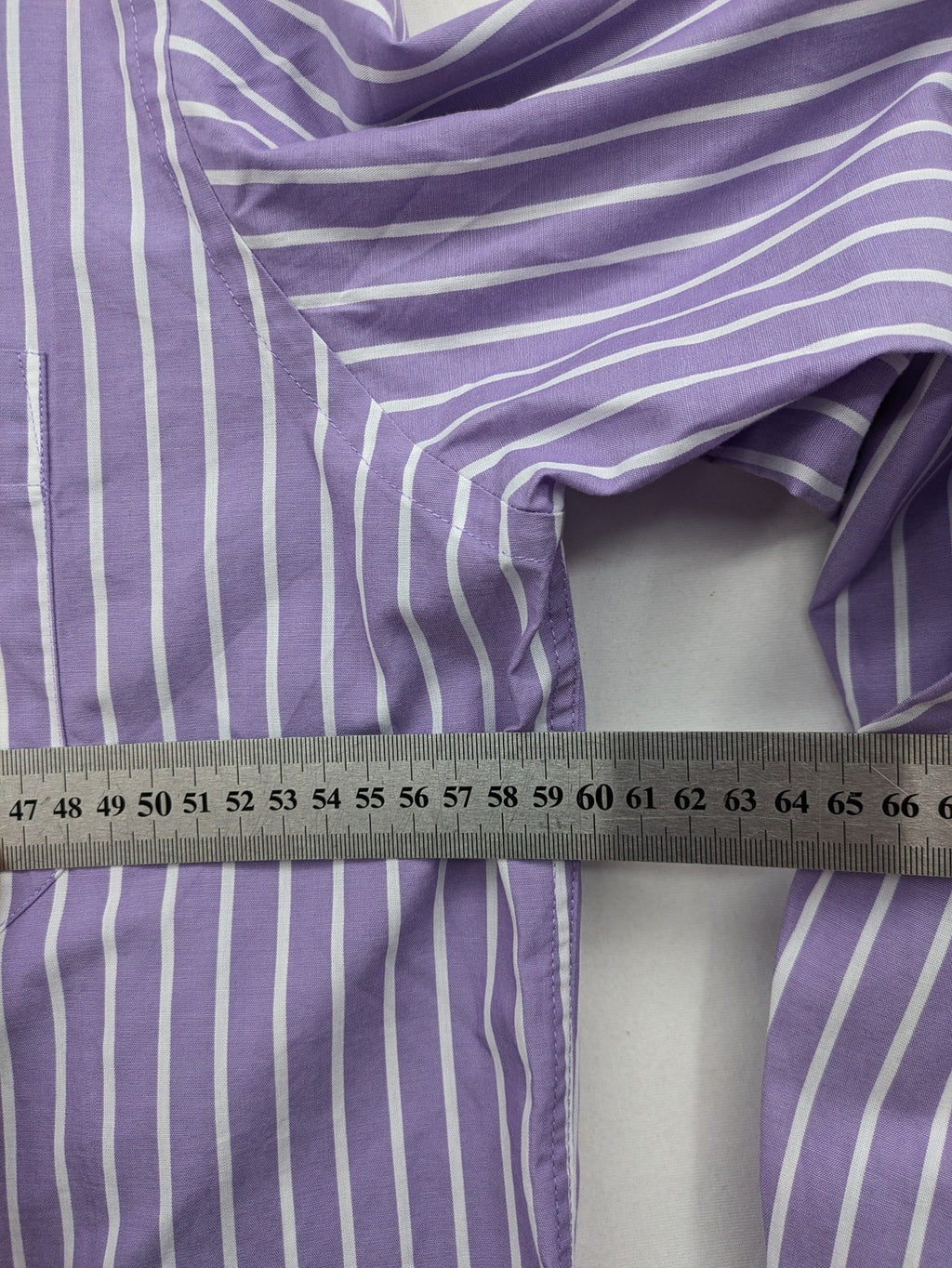 C.Comberti pink button-up shirt with vertical purple and white stripes, easy-care fabric.