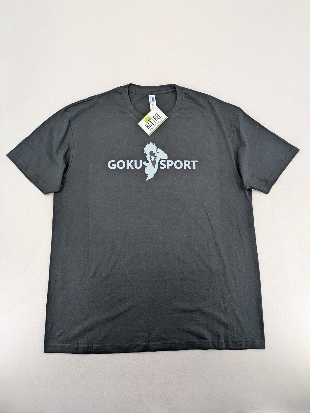 Dragon Ball Z blue graphic t-shirt featuring Goku Sport text and soft cotton material.