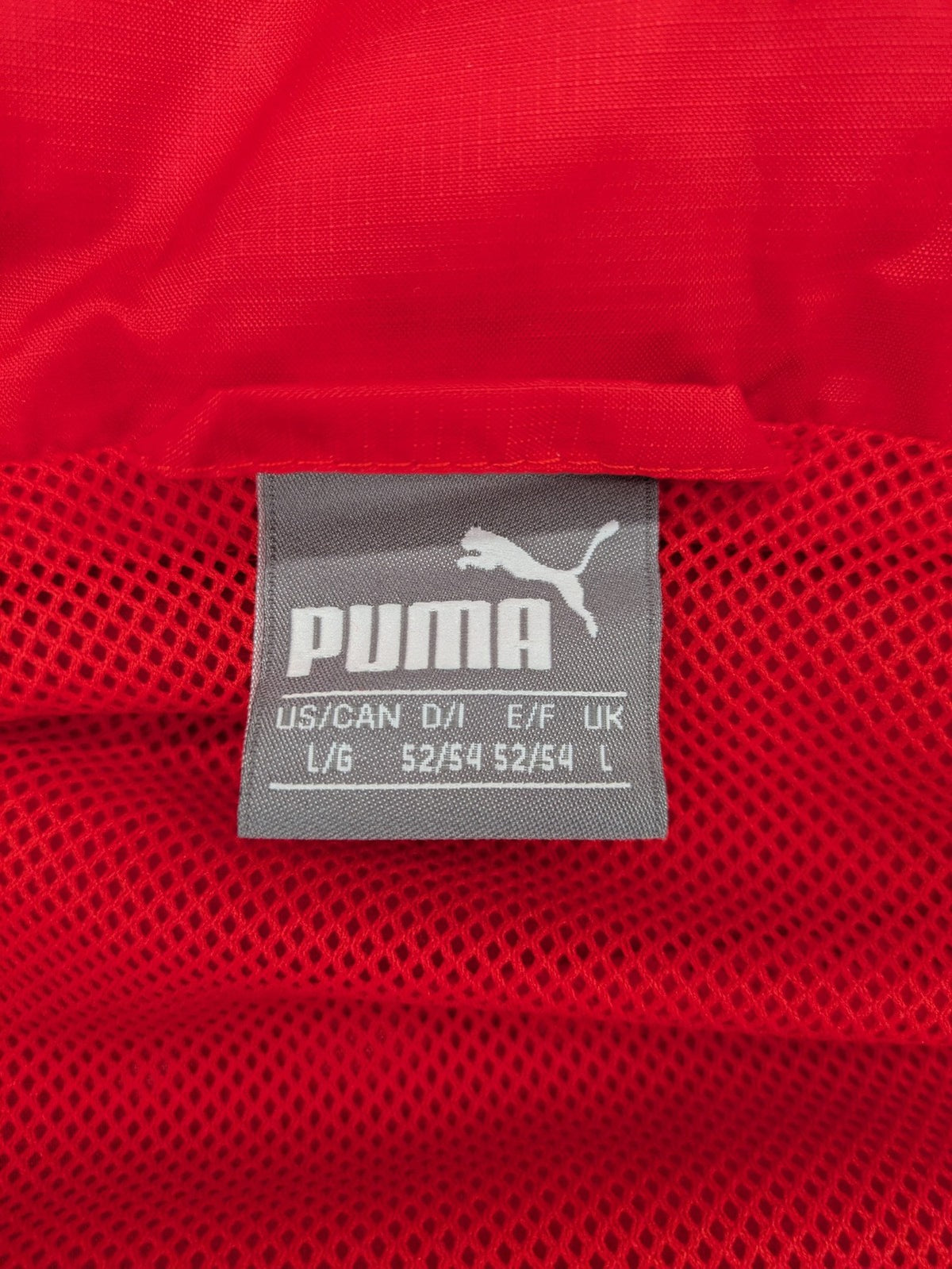 Puma red windbreaker jacket full zip with iconic logo and breathable mesh lining.