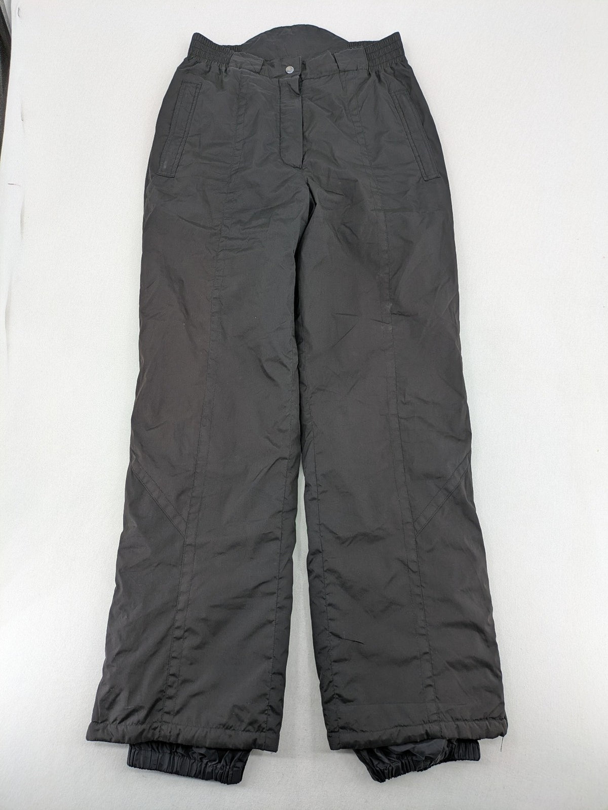 GEF black ski pants size 40, insulated, featuring zippered cuffs and snow gaiters.