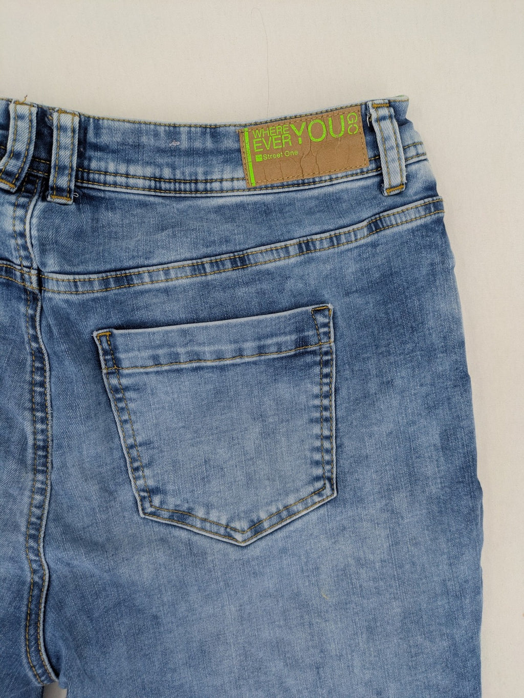 Street One blue straight jeans with green patterned cuffs and button fly detail.