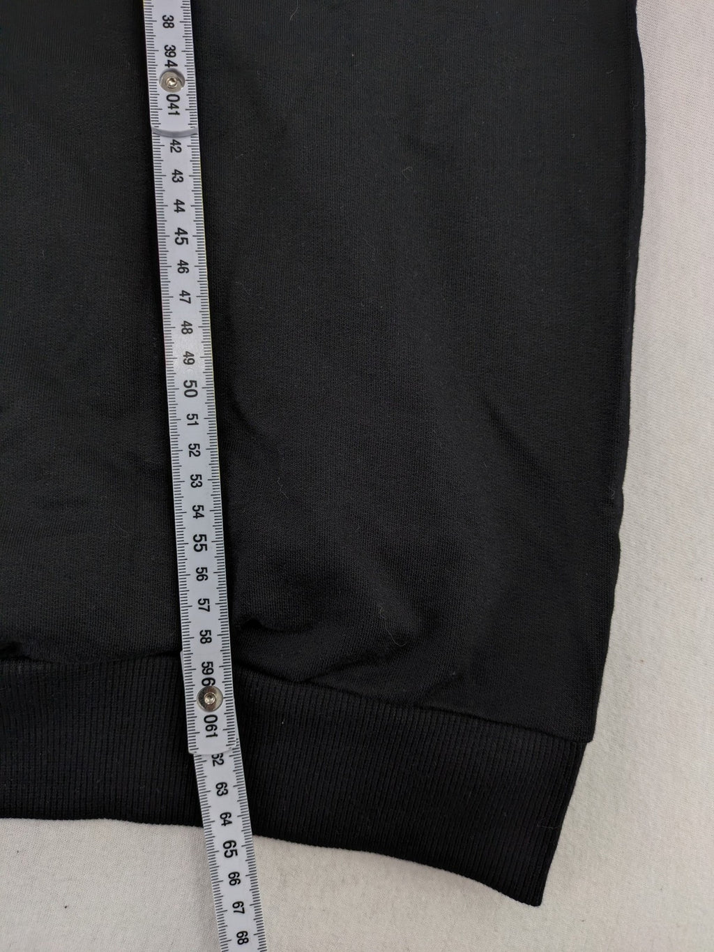LC Waikiki black turtle neck jumper featuring Atatürk graphic print and signature.