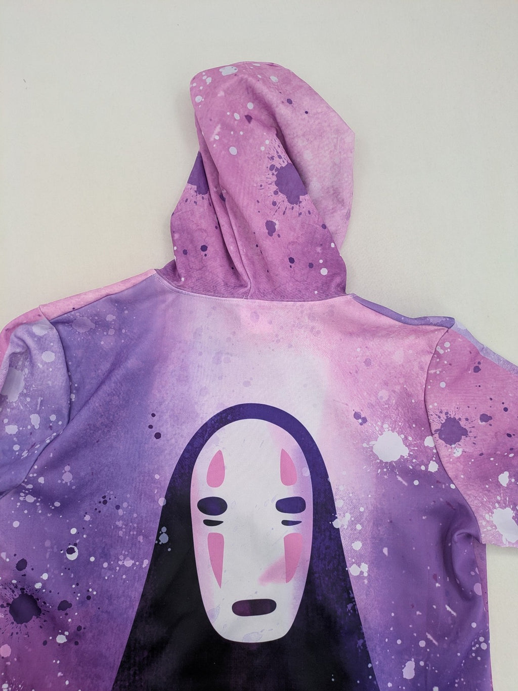 Lila zip-through hoodie multi-coloured featuring No Face graphic, front kangaroo pocket, drawstring hood.