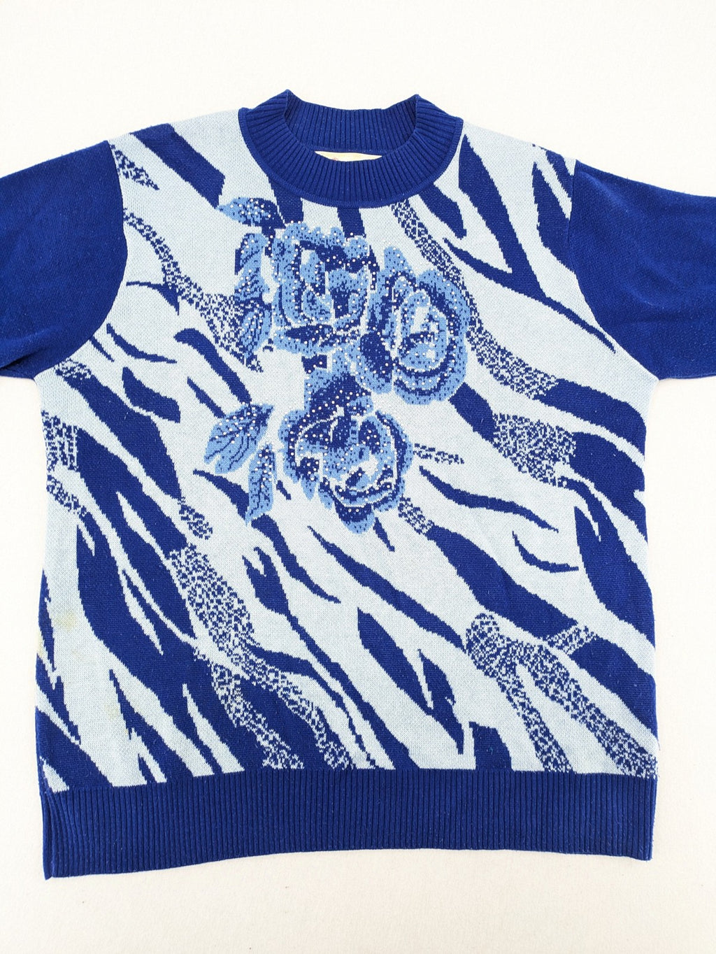 Rodeo pink knit jumper floral animal print with rhinestones and soft fabric.