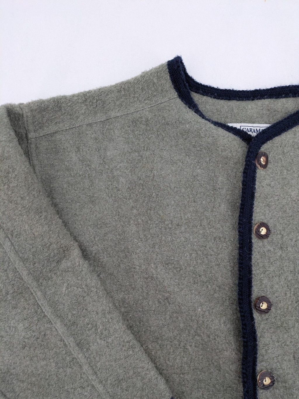 Caramasov grey and navy children's Janker jacket with contrasting trim and rustic buttons.