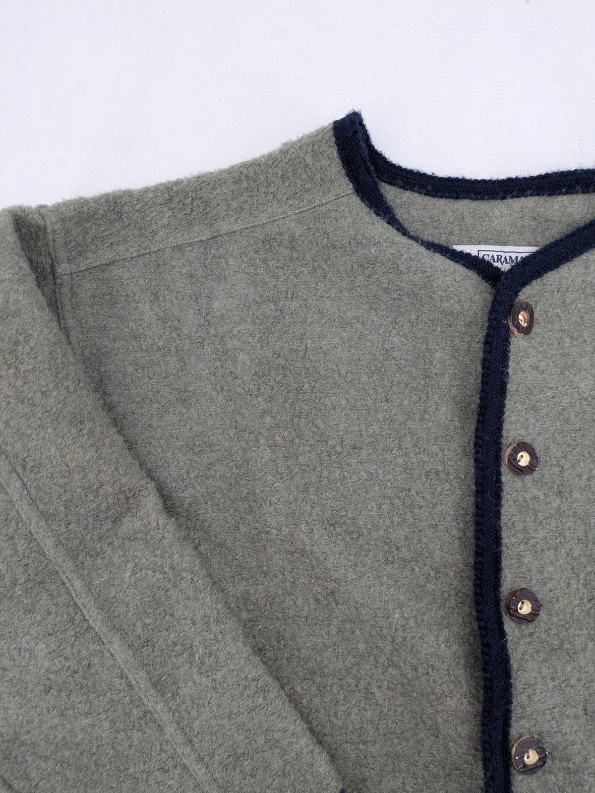 Caramasov grey and navy children's Janker jacket with contrasting trim and rustic buttons.