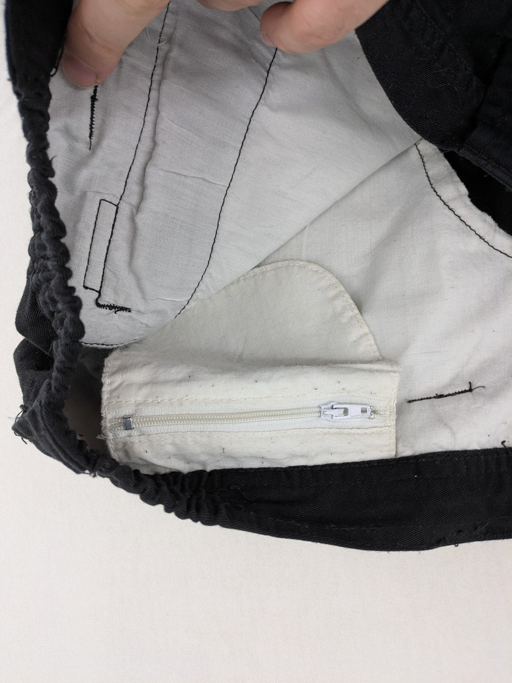 Travel Master black hunting and tactical pants, zip-off design, 100% cotton, multiple pockets.