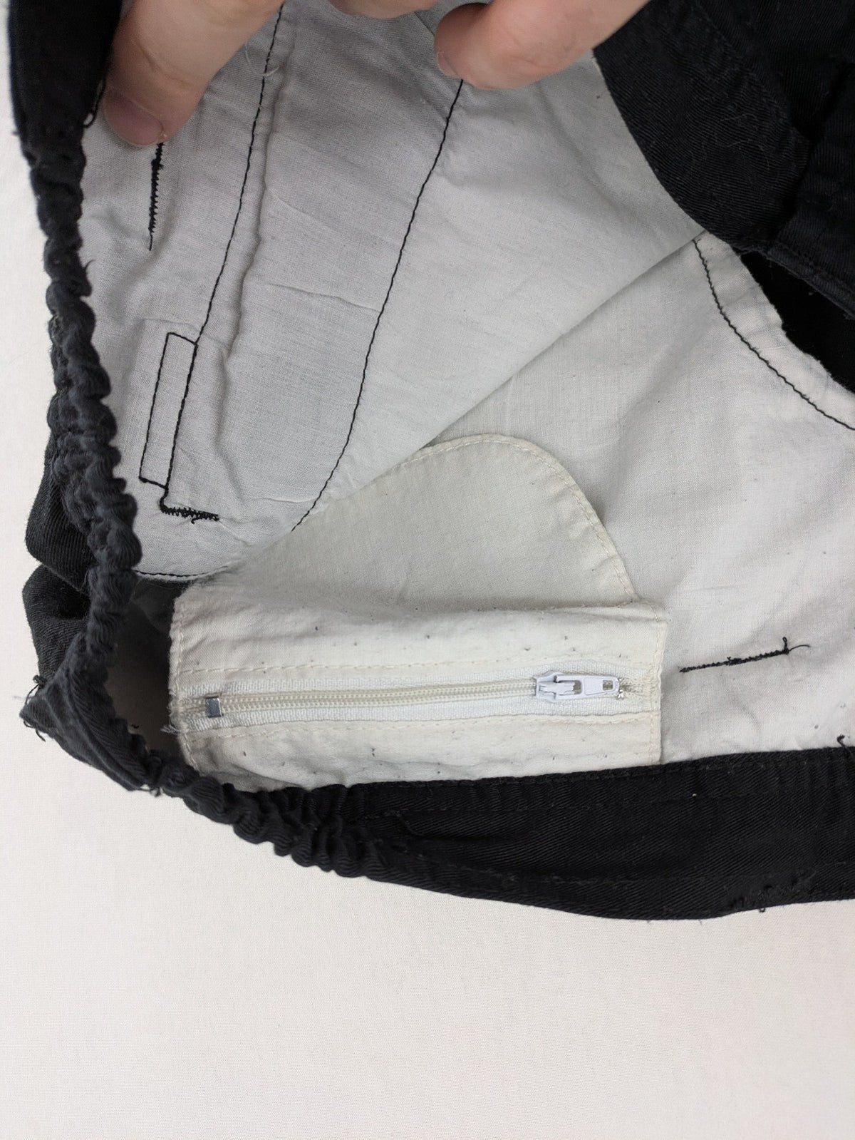 Travel Master black hunting and tactical pants, zip-off design, 100% cotton, multiple pockets.