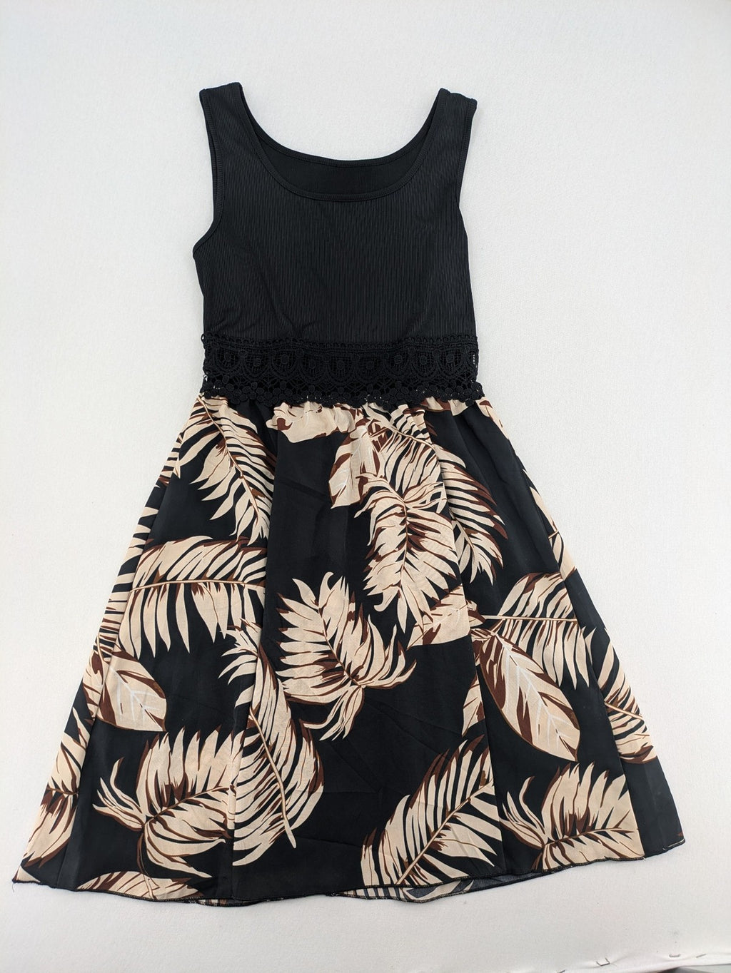 Kontrast summer dress beige tropical leaf print with black ribbed tank top and lace trim.