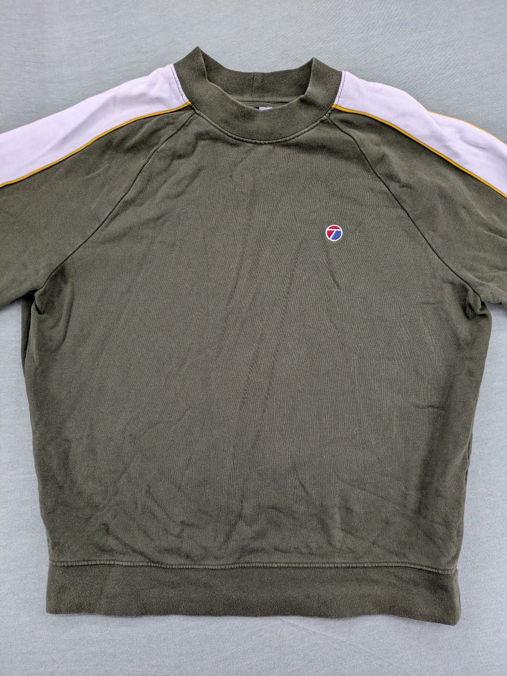 Topman green turtle neck jumper with white colorblock and yellow piping, embroidered logo.