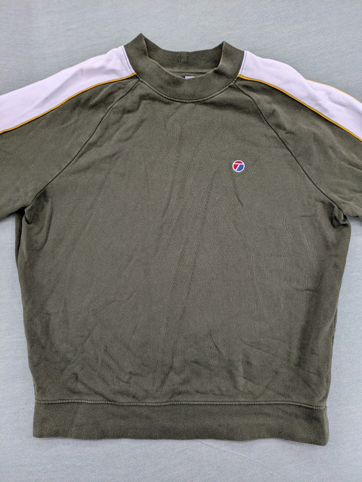 Topman green turtle neck jumper with white colorblock and yellow piping, embroidered logo.