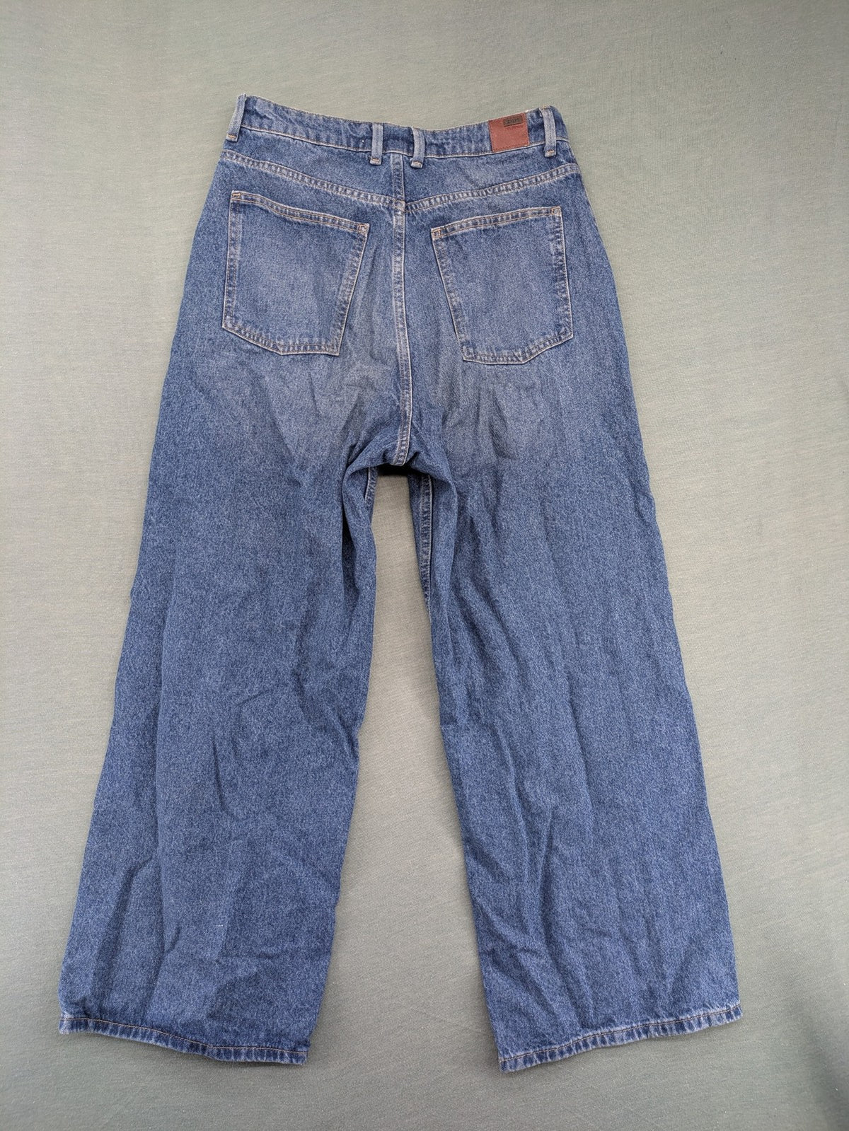 Zara blue wide leg jeans high rise with distressed details and 5-pocket design.