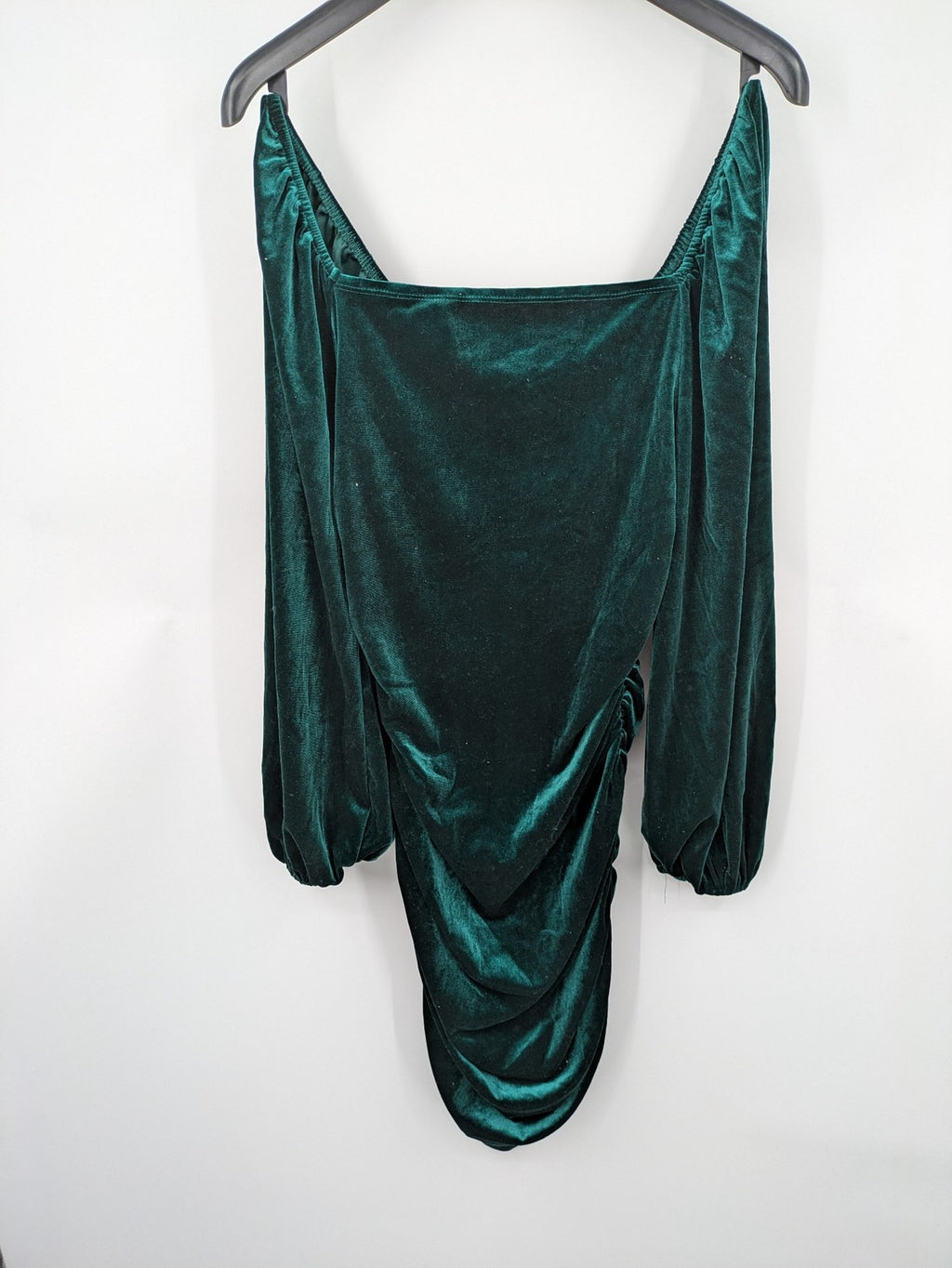 SHEIN green bodycon dress with ruched details, square neckline, and long puff sleeves.