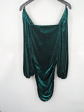 SHEIN green bodycon dress with ruched details, square neckline, and long puff sleeves.