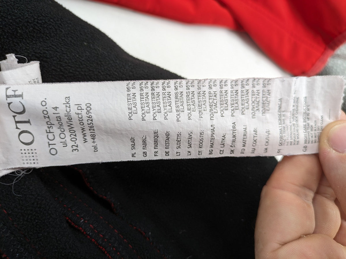 4F red softshell jacket with fleece lining and Aquatech 3000 logo detail.