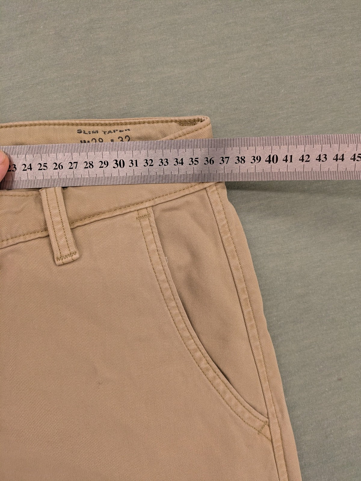 Levi's beige XX Chino pants slim taper fit with classic logo and quality fabric.