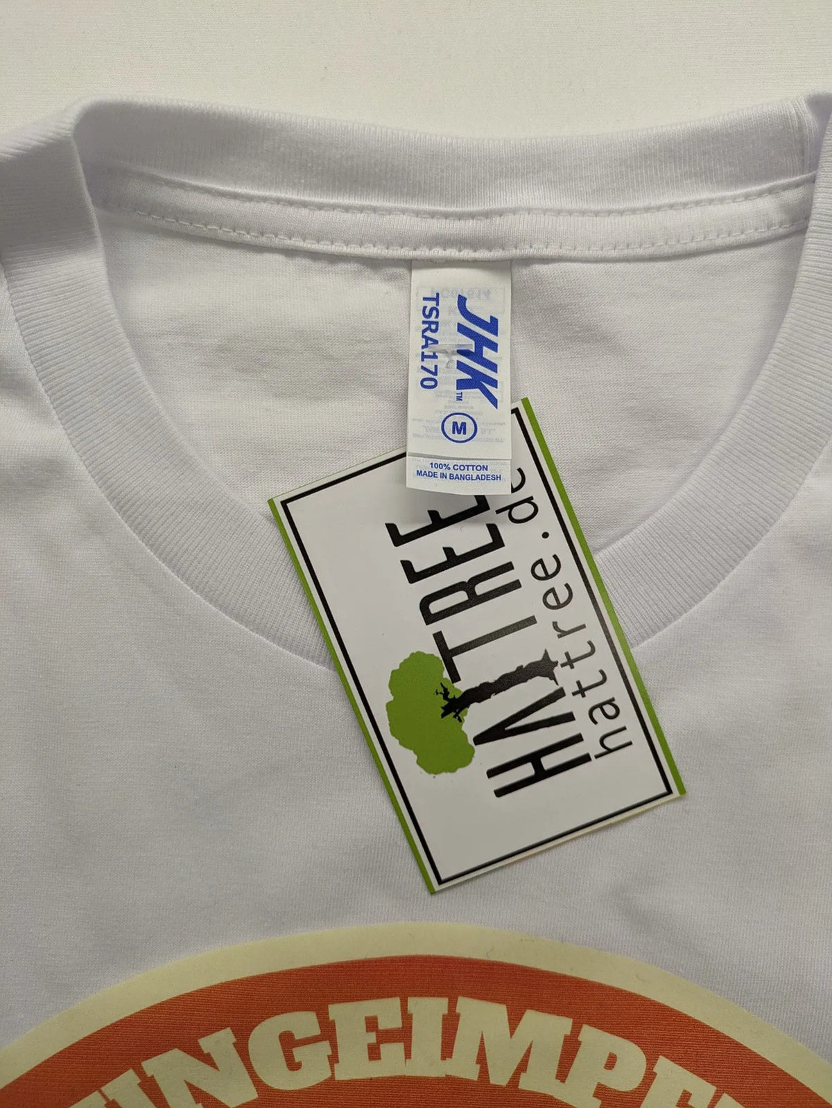 Hattree orange and white T-shirt with graphic print "Ungeimpft Mensch Zweiter Klasse".