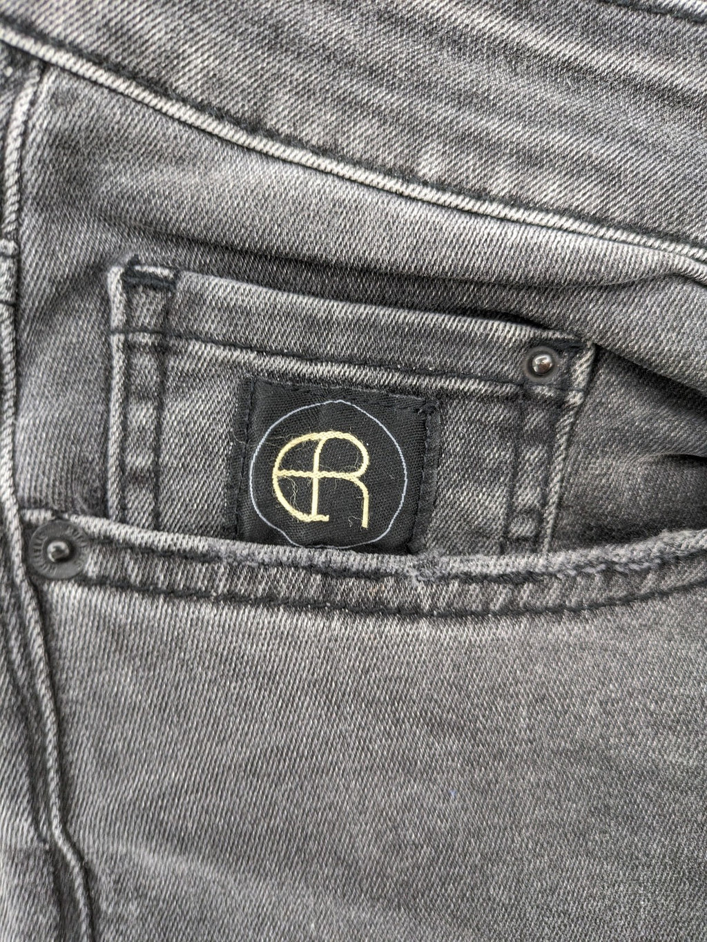 Elias Rumelis grey super slim fit jeans with stitched logo and subtle used look.