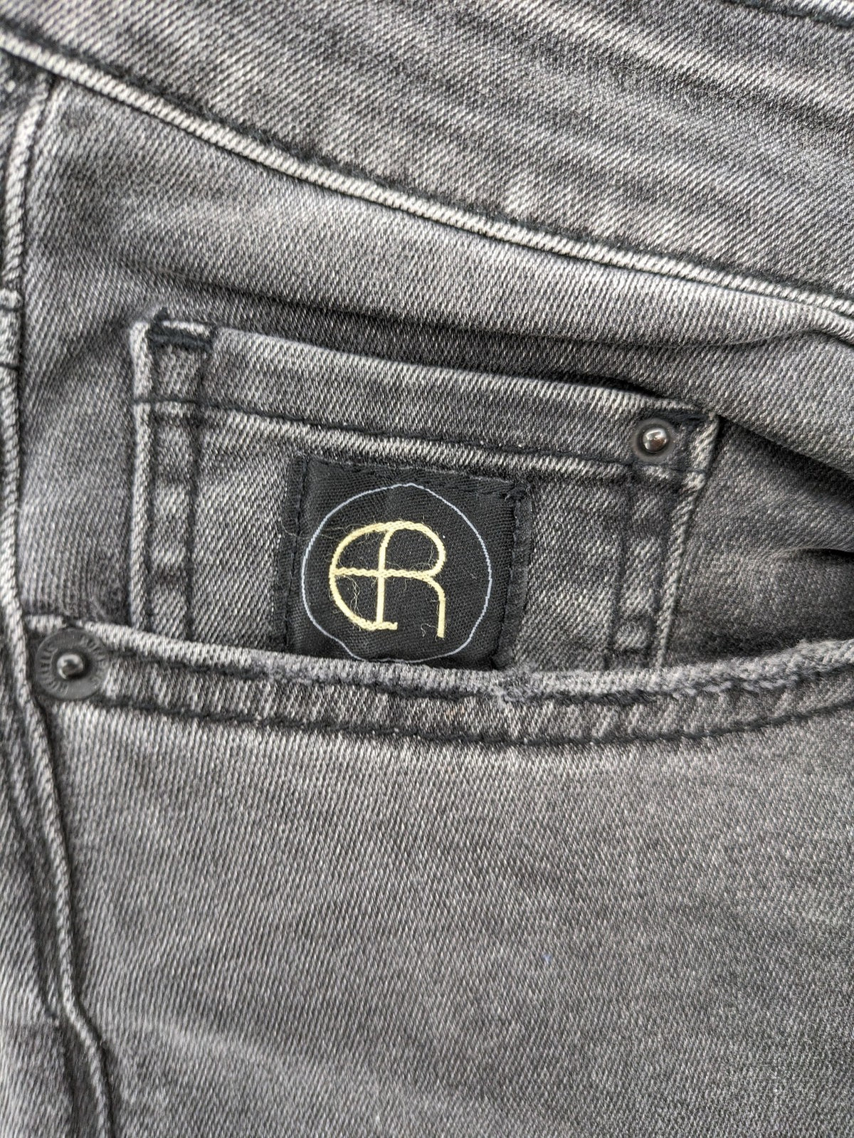 Elias Rumelis grey super slim fit jeans with stitched logo and subtle used look.