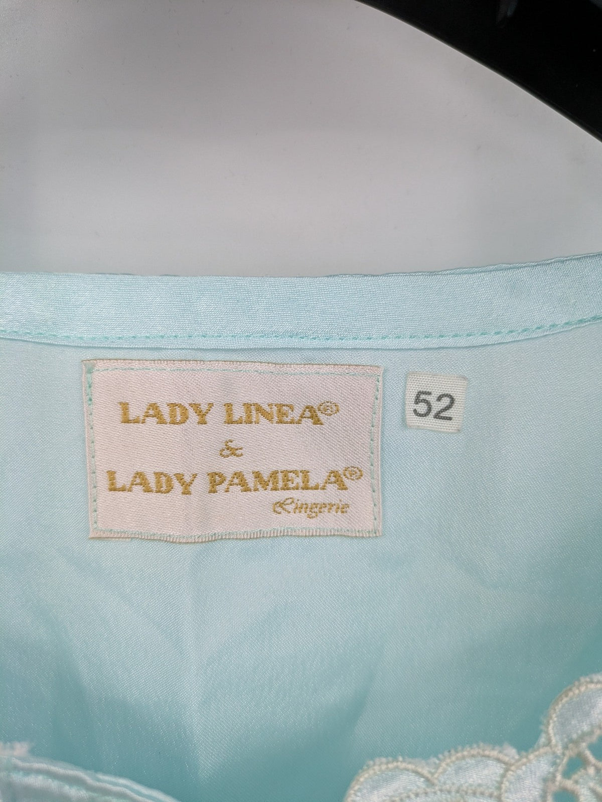 Linea blue vintage nightgown satin fabric with embroidered floral lace collar and ruffles.